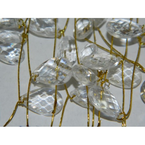 Transparent gemstones on a golden wire 2m