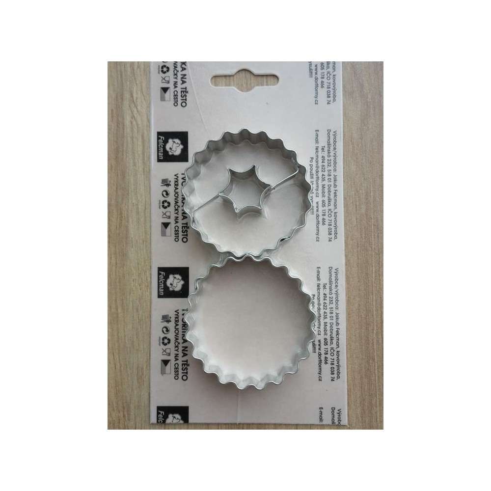 Set of pastry cutters - large fluted circles with a center.